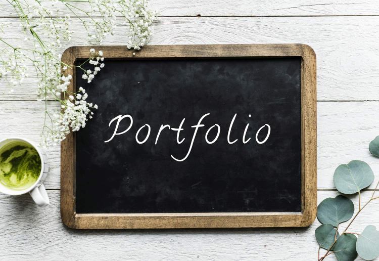 A chalkboard with "portfolio" written on it. Photo by rawpixel.com on Unsplash.